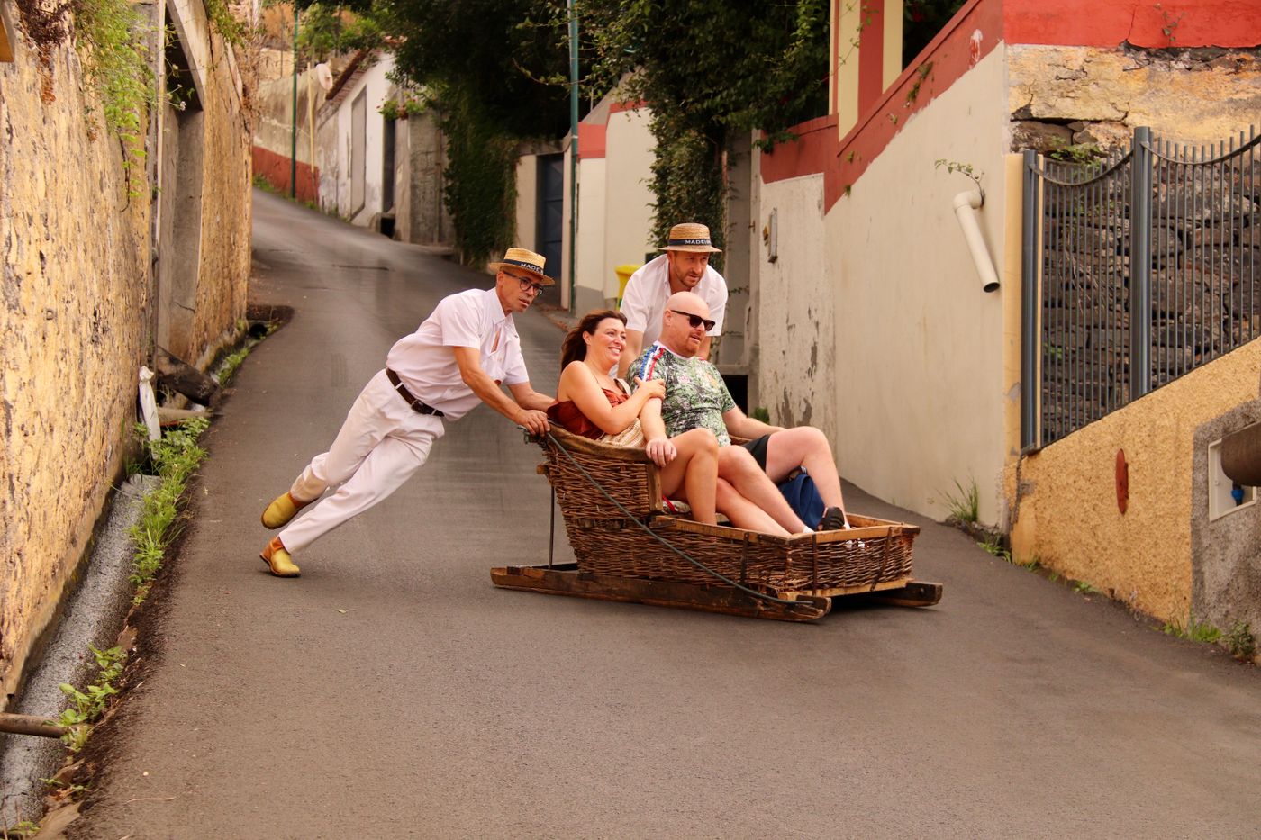 A wicker toboggan sledge on the streets of Monte, Madeira