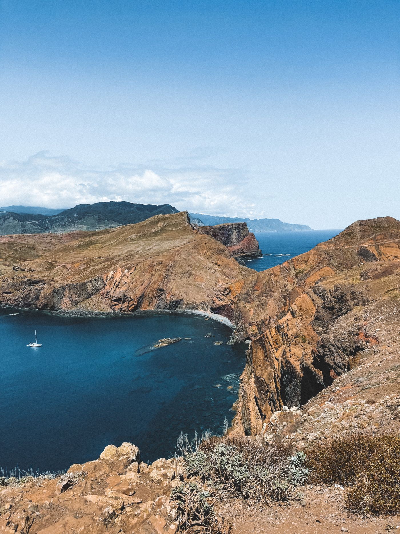 The bare red and ochre cliffs of the Ponta de São Lourenço peninsula